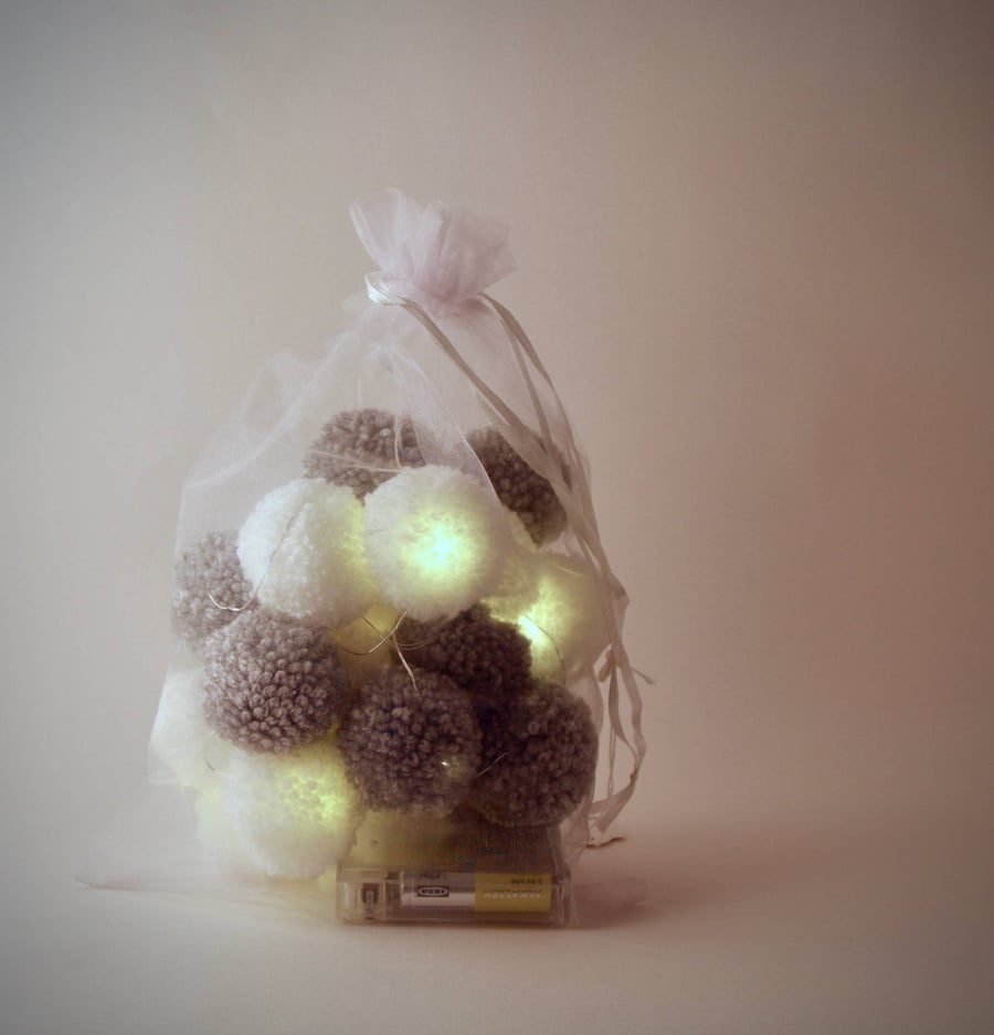 20 fairy lights with Grey and White pom-poms.