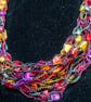 Crocheted necklace, lightweight, in shades of pink, purple, yellow and green - Image 2