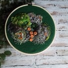Hand embroidered mossy wall art