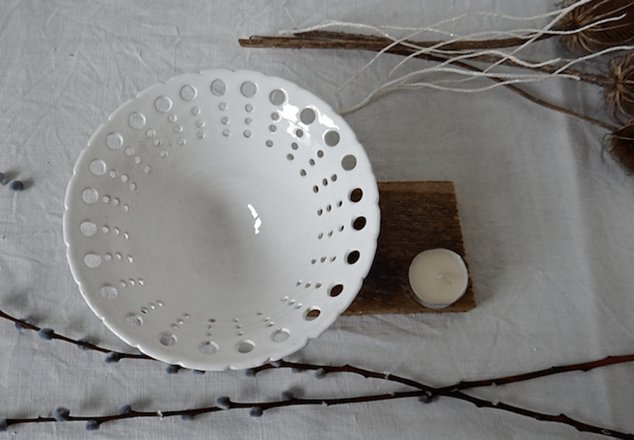 Creamy-white ceramic bowl with pierced rim - handmade stoneware pottery