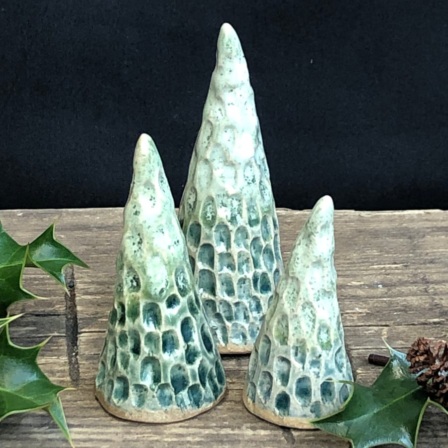 Small carved trio of trees