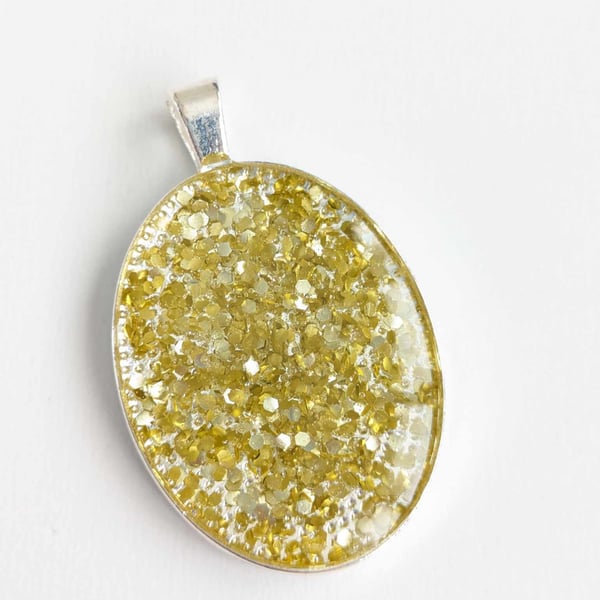 Oval Pendant With Gold Glitter
