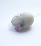 Circle pendant in brushed aluminium with pink and turquoise discs - Image 2