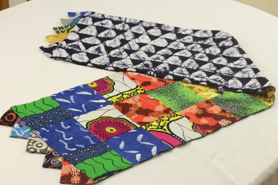 multicoloured hand cut African fabric inspired reversible patchwork table runner