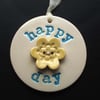 Ceramic decoration Happy Day with flower button