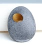 Pebble brooch with gilded hole that goes through the stone. Nature inspired. - Image 2