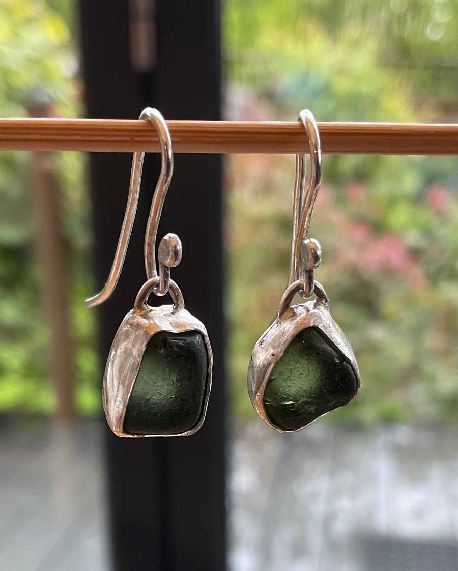 Beautiful deep rich green seaglass earrings set in silver.