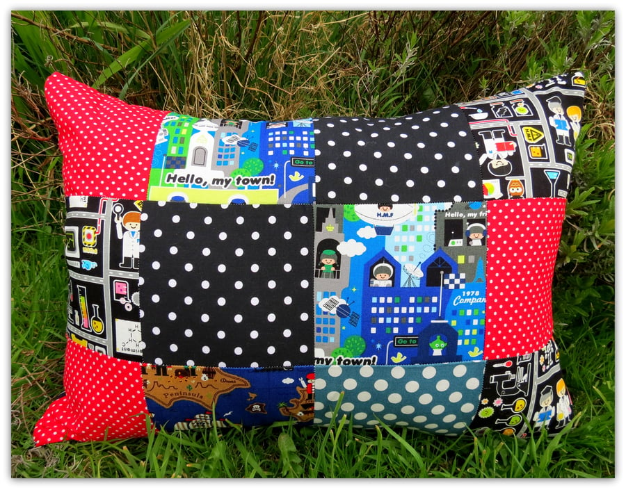 SALE! Pirates, space and all things science. A patchwork cushion with inner pad.