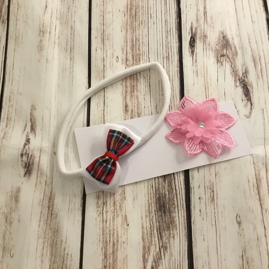 Girls interchangeable hair band with two separate bows and pink flower design 