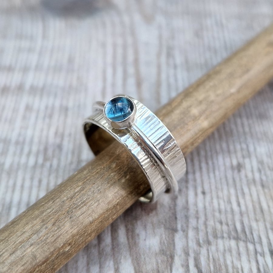 Sterling Silver Textured Spinner Ring with London Blue Topaz Gemstone