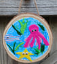 Wooden and fabric sea creatures wall art