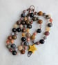Jasper knotted cord necklace in earthy colours with yellow howlite star - Image 4