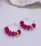 Gold plated hoops with fuchsia jade beads - Image 2