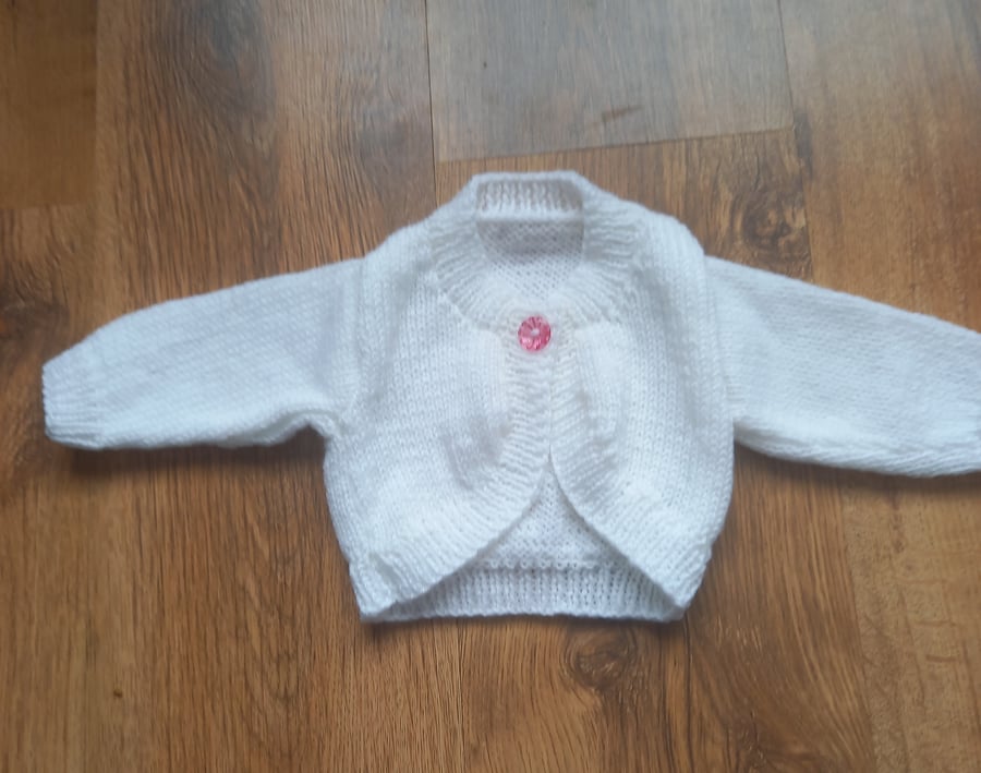 Hand knitted baby girls cardigan