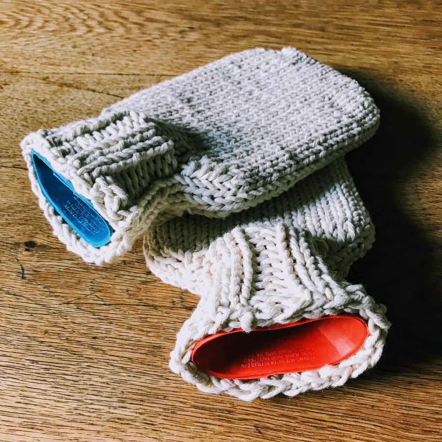 Mini Hot Water Bottle - hand knitted string cover with bright coloured bottle