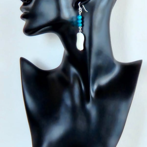 Handcrafted, stylish white and blue wavy glass dangle earrings