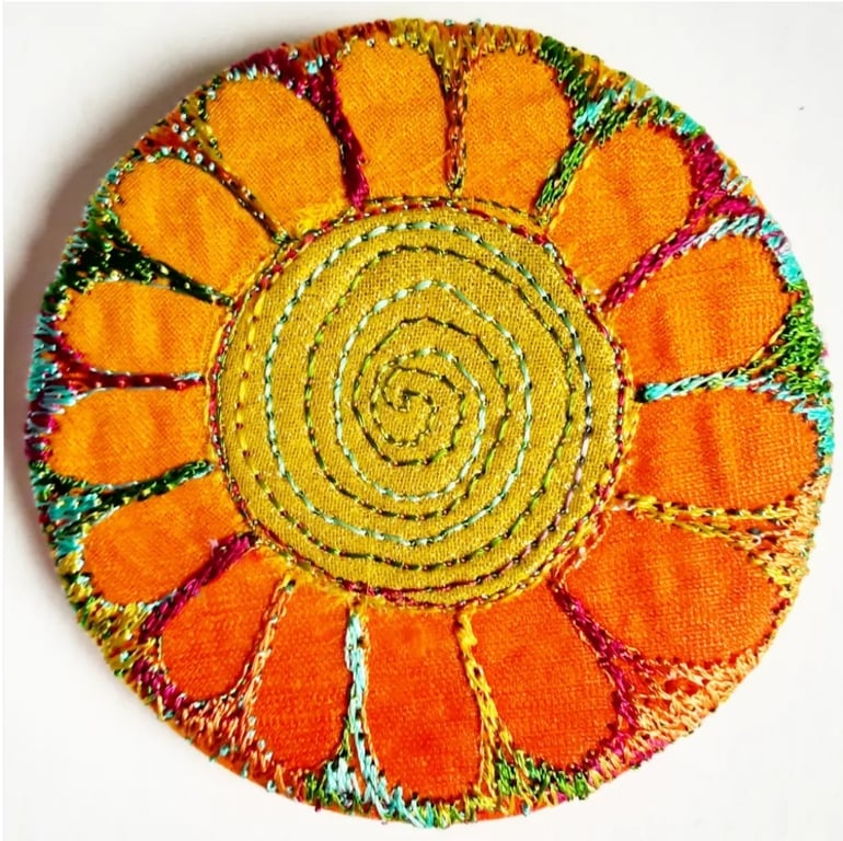 58mm Fabric Badge with Free Machine Embroidery Orange and Orange Flower 
