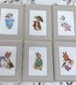 Set of 6x Beatrix Potter framed cross stitch wall hanging pictures