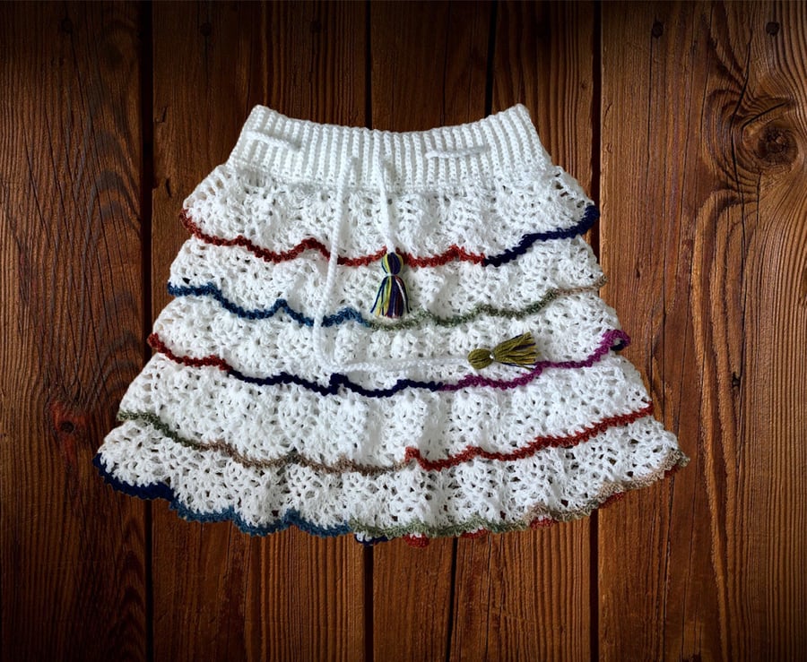 Ruffle mini crochet skirt. White and multicoloured. U.K. size small S.