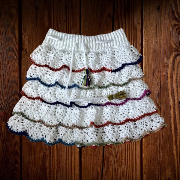 Ruffle mini crochet skirt. White and multicoloured. U.K. size small S.