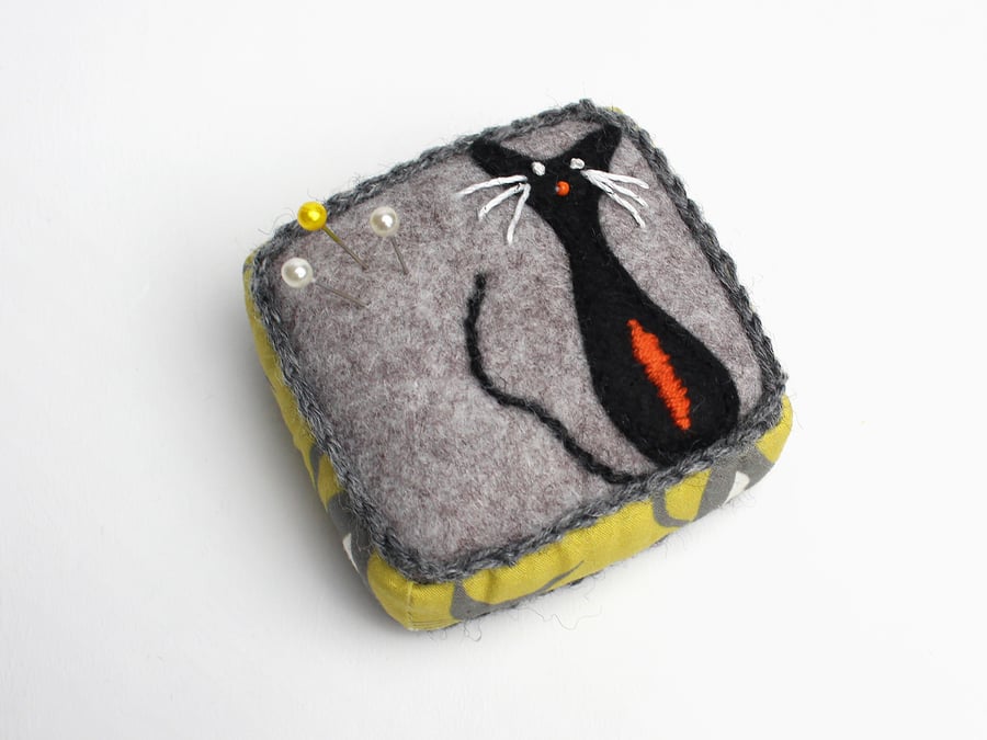 Pin cushion with mustard cat print and hand appliquéd cat 