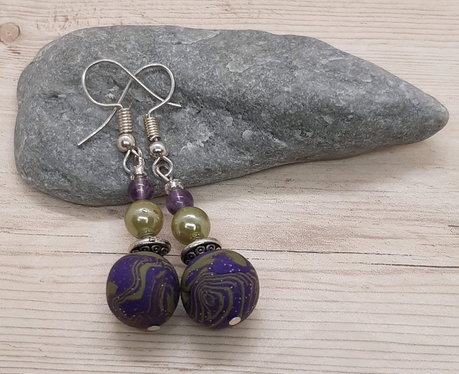 Dangly earrings in sage green and purple