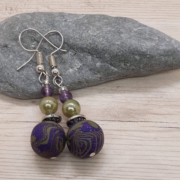 Dangly earrings in sage green and purple