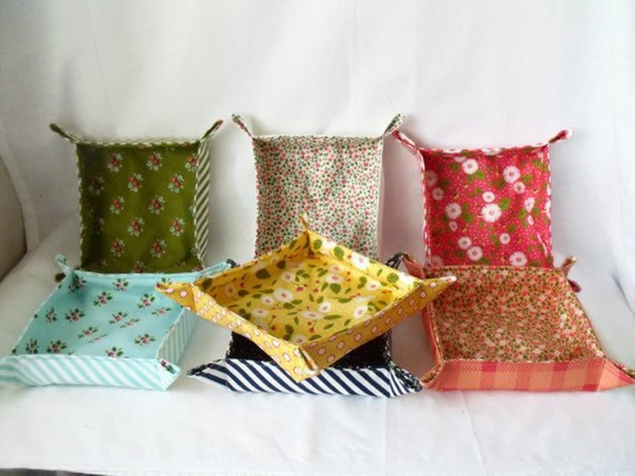 shallow folded fabric storage tray for your bits and bobs, green striped