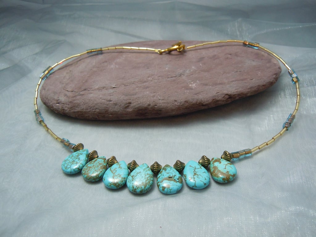 Magnesite turquoise teardrop bead necklace with gold plate beads