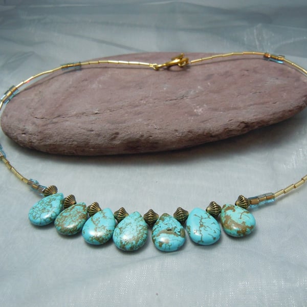 Magnesite turquoise teardrop bead necklace with gold plate beads