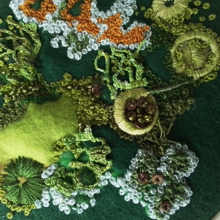 Hand embroidered and beaded textile art