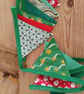 Handmade Christmas mini bunting in a green red colourway - Image 1