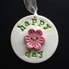 Ceramic decoration Happy Day with flower button