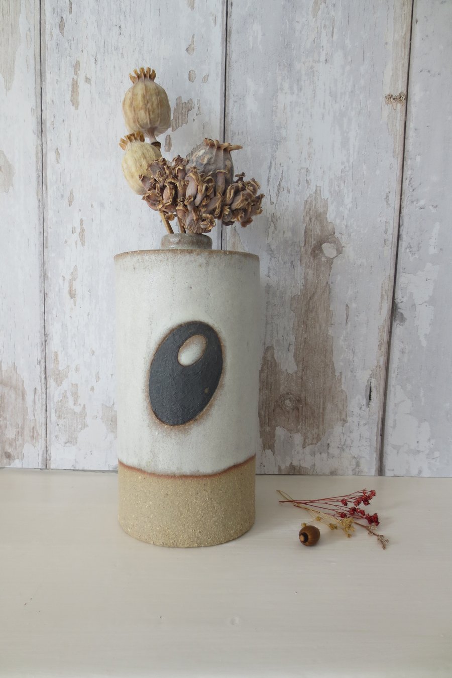 Hand-built stoneware pottery bottle in white and black