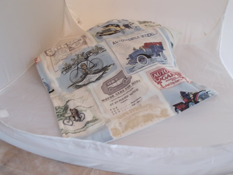 Lovely soft lap mat for cat. Print with vintage style posters of cars and cycles