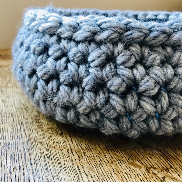 Wide, chunky blue grey crocheted bowl