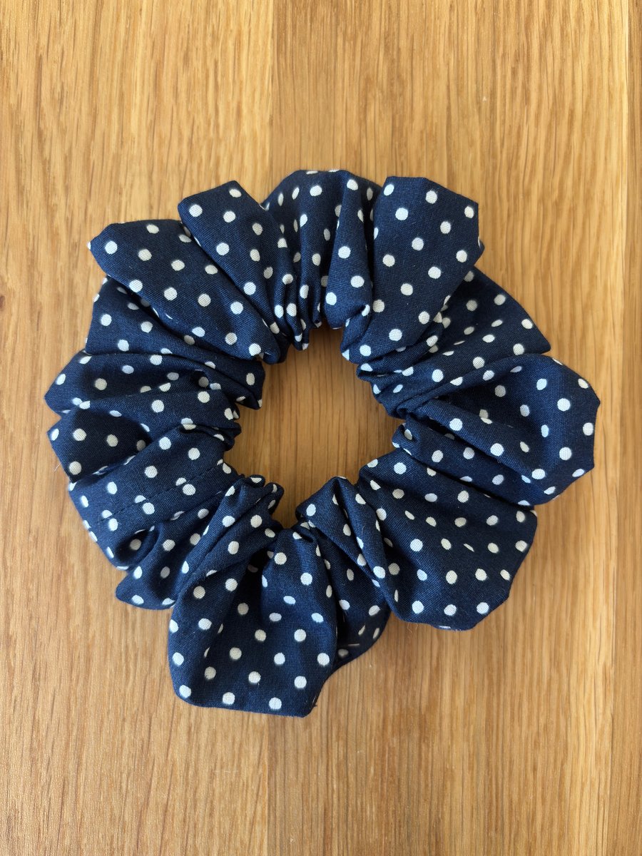 Cotton scrunchie hair accessory in navy and white spot design