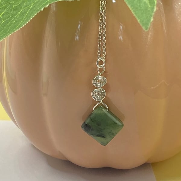 Nephrite jade square pendant with sterling silver spirals