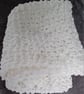 Cosy and soft hand knitted white large baby blanket