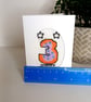 Hand stitched age three birthday card featuring a colourful cross stitch - Image 5
