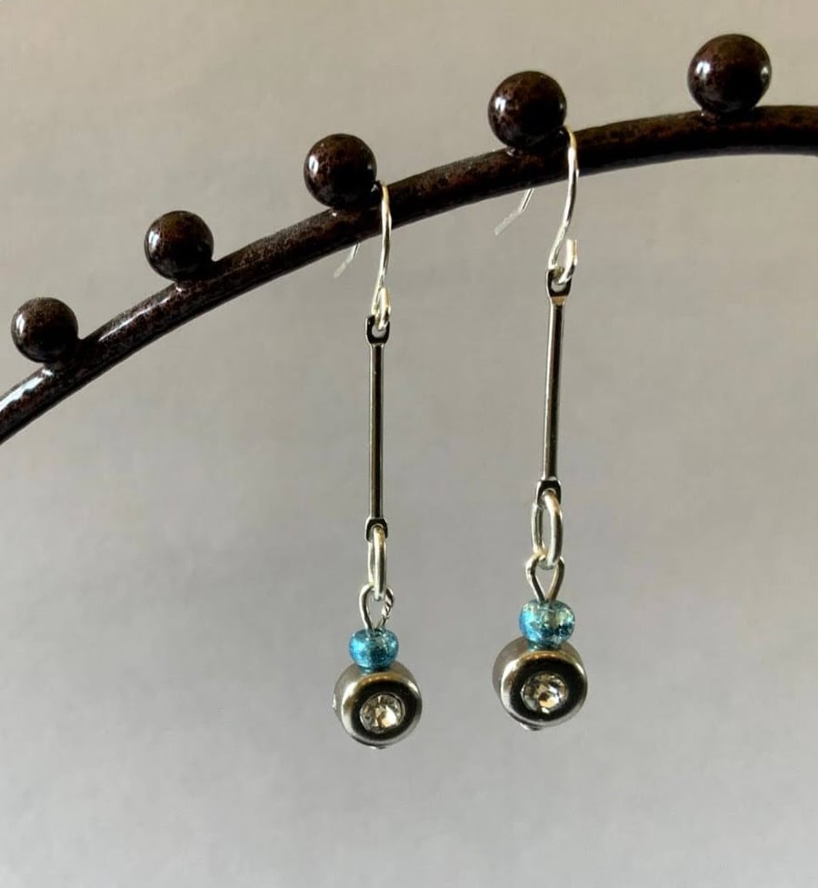 Simulated diamond  long pin earrings.