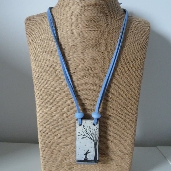 blue faux suede necklace, ceramic hare pendant