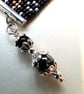Handmade seed bead bracelet in black and silver - Image 3