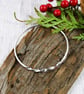 Sterling Silver Bangle with Twist and Crosshatch Pattern. Size Small 19cm 