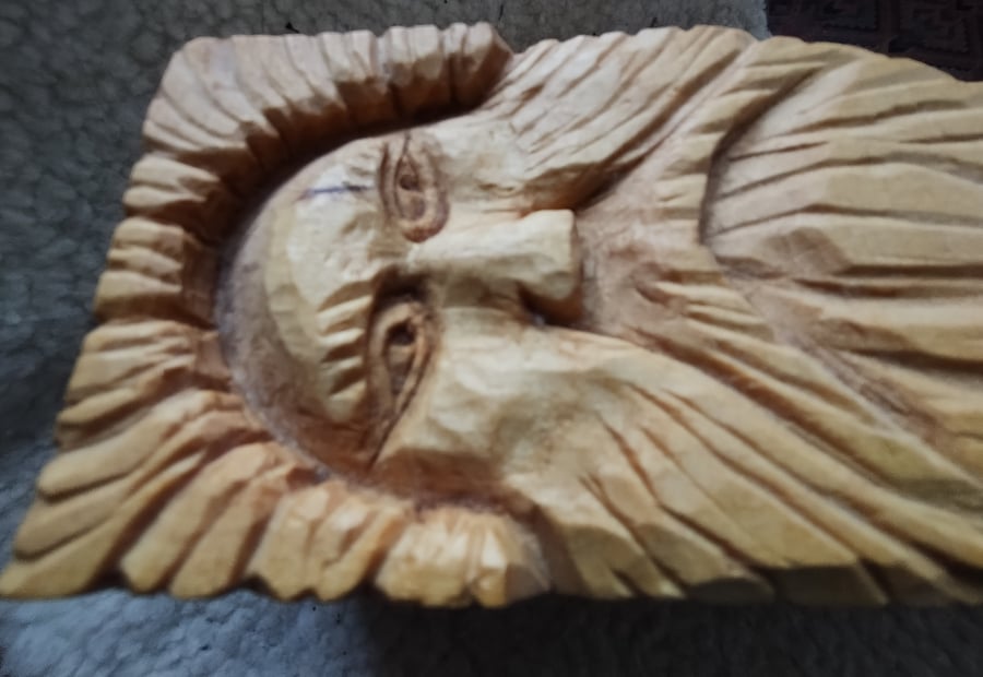 carved box with face