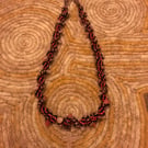 Spiral necklace with cross