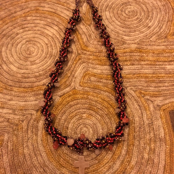 Spiral necklace with cross