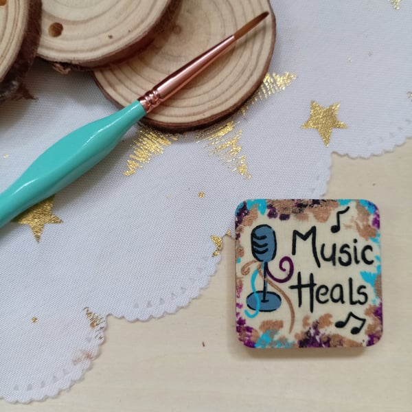Wooden square shaped music heals fridge magnet