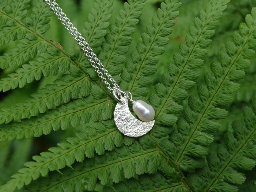 Crescent moon pendant in recycled silver with freshwater pearl