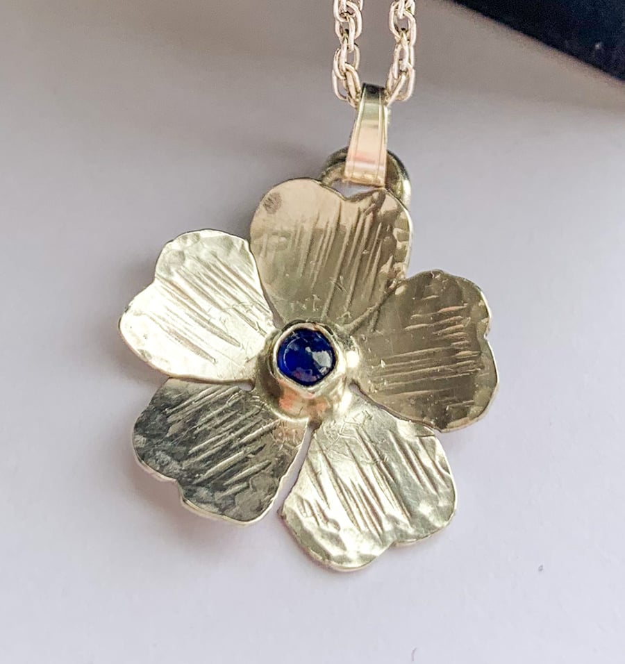 Silver and sapphire flower pendant necklace